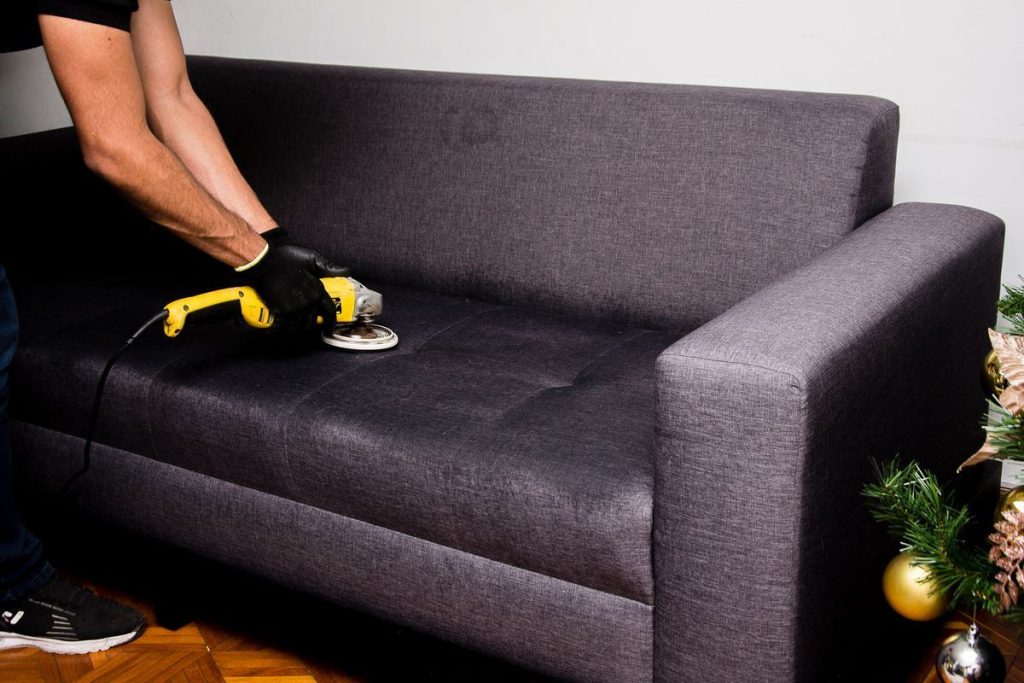 Machine cleaning a fabric sofa