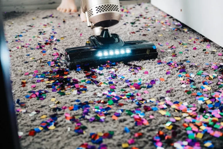 Vacuum cleaner lifting dirt and debris from a carpet